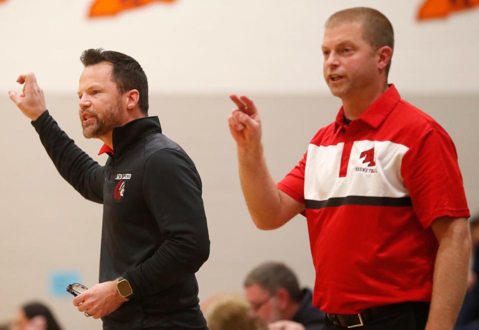 Twin Lakes head coach Brad Bowsman and Twin Lakes assistant coach Troy Nickerson yell down court during the IU Health Hoops Classic girl’s basketball fifth place game against the Harrison Raiders, Saturday, Nov. 18, 2023, at Harrison High School in West Lafayette, Ind. Twin Lakes won 61-42.