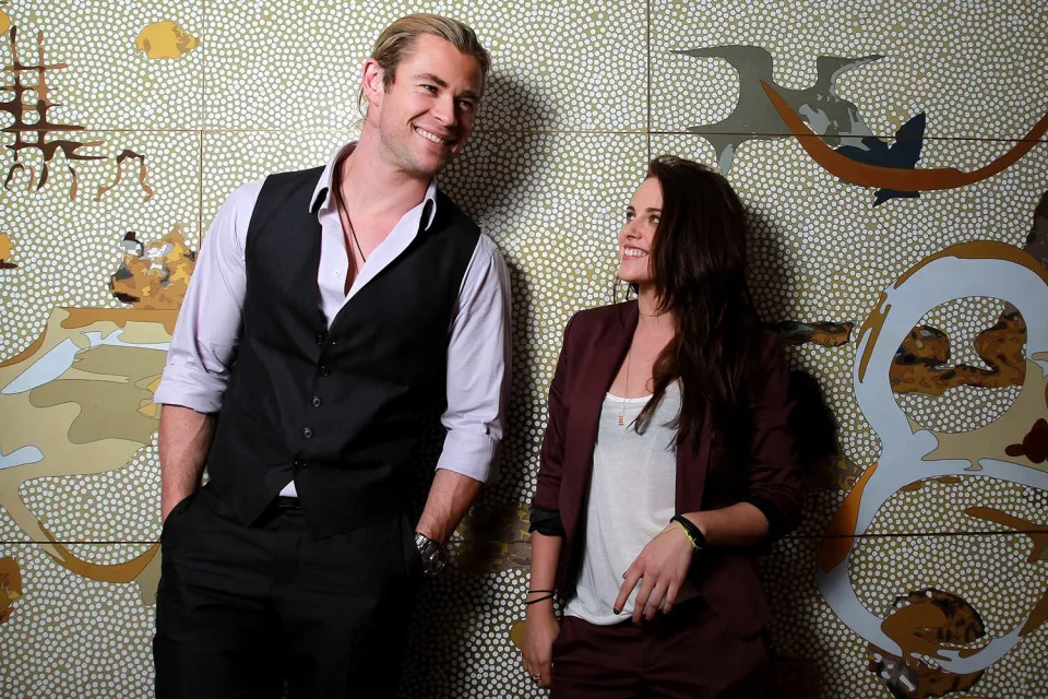 Australian actor Chris Hemsworth and US Actress Kristen Stewart pose during a photo shoot at the Park Hyatt Hotel on June 19, 2012 in Sydney, Australia.