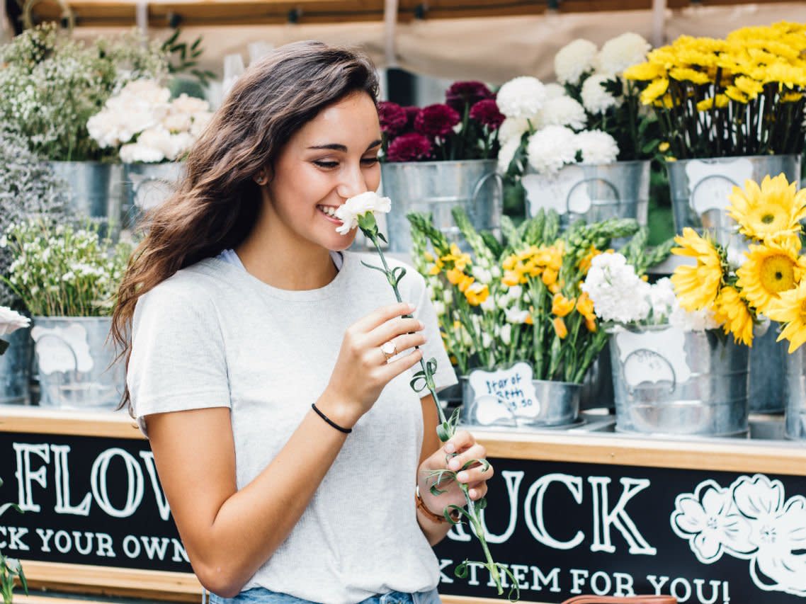 woman flowers smile