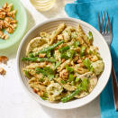 <p>Homemade pesto may seem daunting, but in this quick pasta recipe you can make a simple sauce in minutes while the pasta water comes to a boil. You can substitute frozen green beans and cauliflower for fresh; in Step 4, cook the frozen vegetables according to package directions before tossing with the pasta and pesto. <a href="https://www.eatingwell.com/recipe/270567/chicken-vegetable-penne-with-parsley-walnut-pesto/" rel="nofollow noopener" target="_blank" data-ylk="slk:View Recipe;elm:context_link;itc:0;sec:content-canvas" class="link ">View Recipe</a></p>
