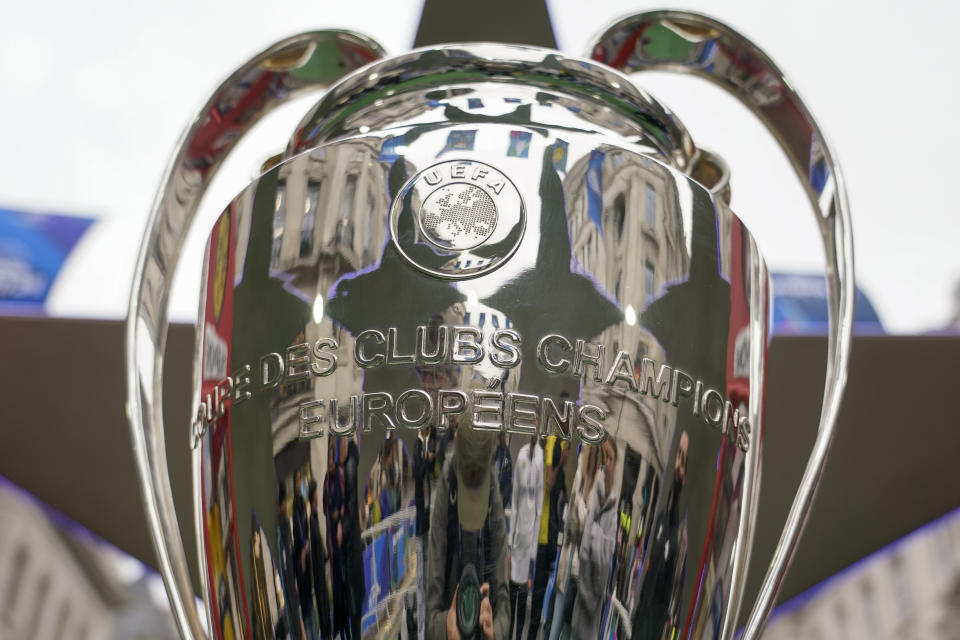 The trophy is displayed in a fan zone in Regent Street, in London, Friday, May 31, 2024, ahead of tomorrow's UEFA Champions League final at Wembley stadium between Borussia Dortmund and Real Madrid. (AP Photo/Alberto Pezzali)