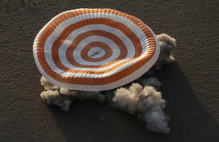 The Soyuz MS-04 capsule carrying the International Space Station (ISS) crew of Jack Fischer, Peggy Annette Whitson of the U.S. and Fyodor Yurchikhin of Russia lands in a remote area outside the town of Dzhezkazgan (Zhezkazgan), Kazakhstan September 3, 2017. REUTERS/Sergei Ilnitsky/Pool