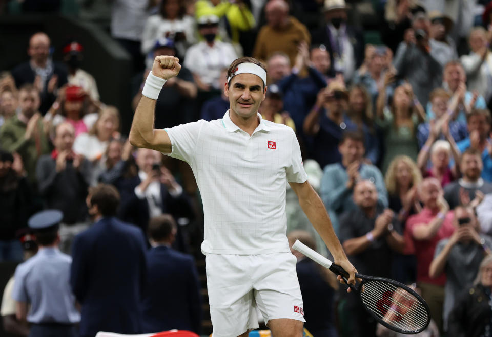 LONDON, ENGLAND - JULY 05: Roger Federer of Switzerland celebrates victory after winning his Men's Singles Fourth Round match against Lorenzo Sonego of Italy during Day Seven of The Championships - Wimbledon 2021 at All England Lawn Tennis and Croquet Club on July 05, 2021 in London, England. (Photo by Clive Brunskill/Getty Images)