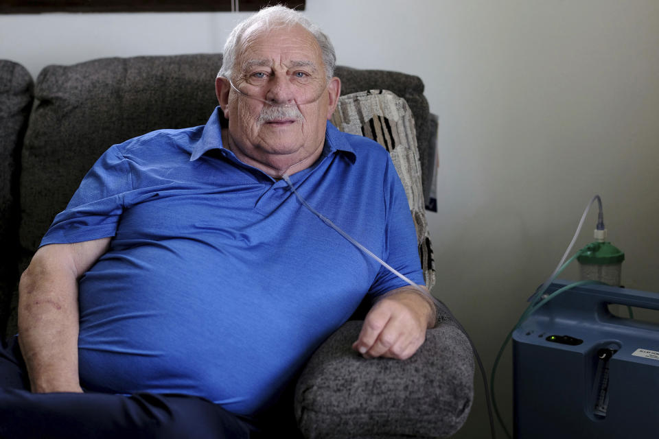 Retired coal miner James Bounds, who has pneumoconiosis, more commonly known as “black lung," poses for a photo at his home in Oak Hill, W.Va., Thursday, July, 13, 2023. Bounds said nothing can be done to reverse the debilitating illness he was diagnosed with at 37 in 1984. But he doesn't want others to suffer the same fate. (AP Photo/Chris Jackson)