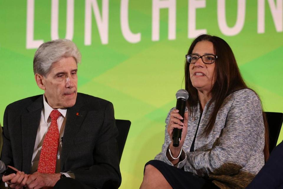 Elizabeth Béjar, provost of Florida International University, speaks while Julio Frenk, president of University of Miami, listens during a luncheon hosted by Greater Miami Chamber of Commerce to talk with leaders in higher education about adjusting to a post-pandemic world on Wednesday, April 5, 2023, at the Jungle Island Bloom Ballroom.
