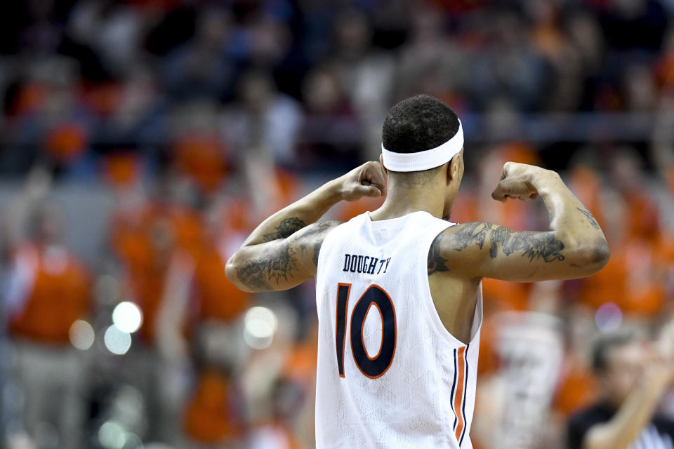 Auburn guard Samir Doughty celebrates a foul call against Vanderbilt during the first half of an NCAA college basketball game Wednesday, Jan. 8, 2020, in Auburn, Ala. (AP Photo/Julie Bennett)