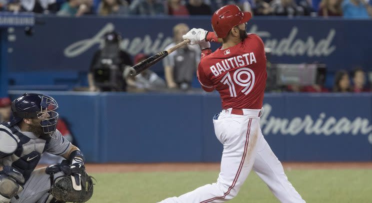 Jose Bautista was provoked by a pitch thrown behind him early and then led the Blue Jays to their first series win of the year on Sunday. (Fred Thornhill/CP)