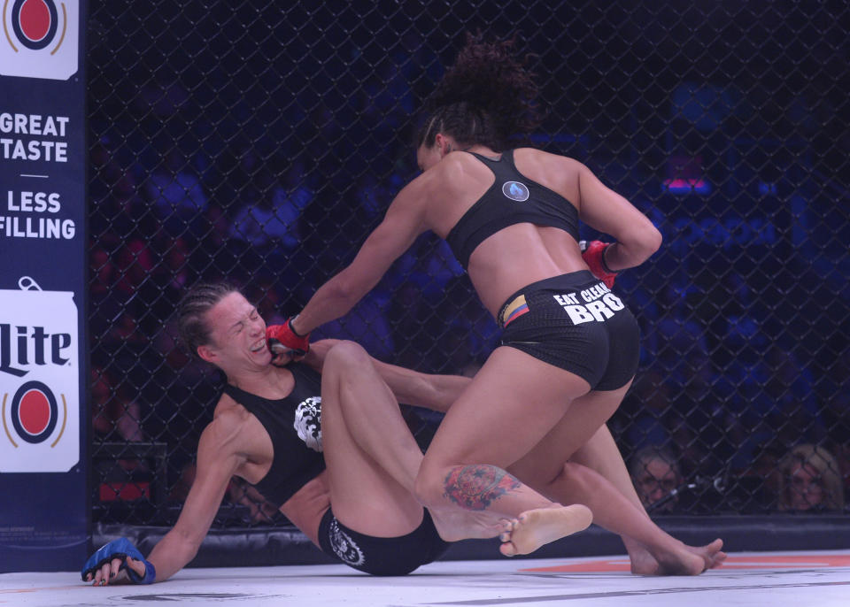 BRIDGEPORT, CT - AUGUST 24: Alejandra Lara (red gloves)  takes on Taylor Turner (blue gloves) in a bantamweight bout on August 24, 2019 at the Webster Bank Arena in Bridgeport, Connecticut.  (Photo by Williams Paul/Icon Sportswire via Getty Images)