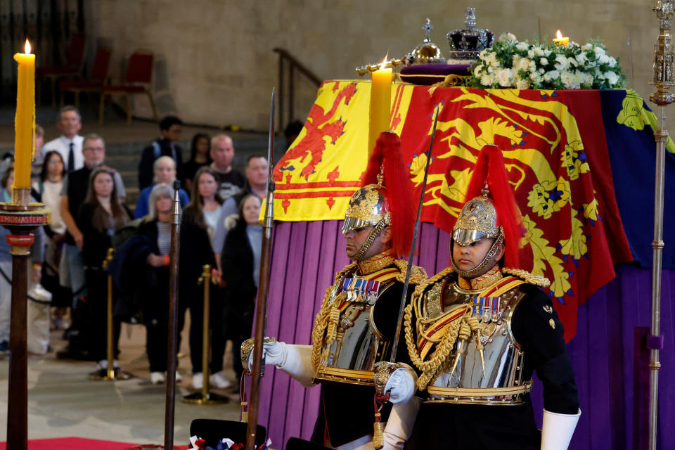 LONDON, ENGLAND - SEPTEMBER 18: Household Cavalry, Blues and Royals stand guard where Queen Elizabeth II's flag-draped coffin is lying in state on the catafalque at Westminster Hall on September 18, 2022 in London, England. Chip Somodevilla/Pool via REUTERS