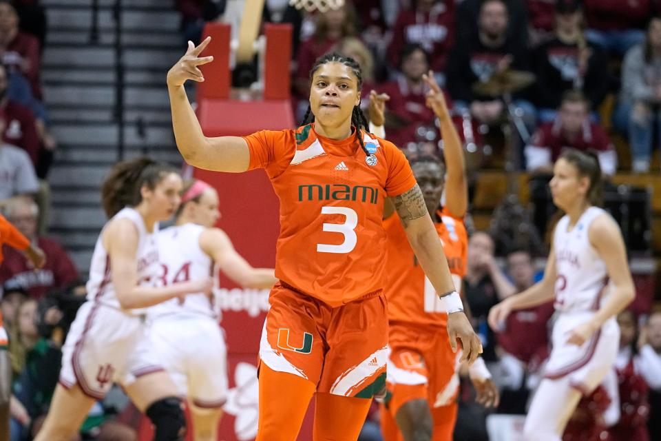 Miami's Destiny Harden (3) celebrates during the first half against Indiana.