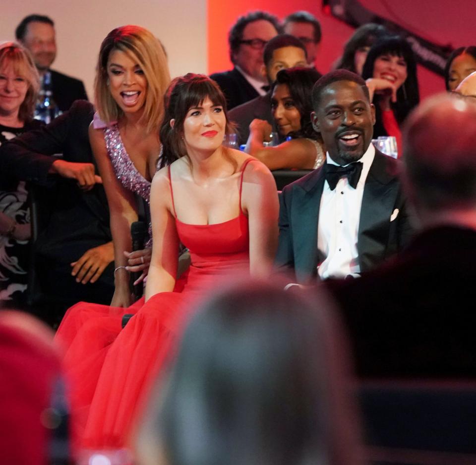 <p><em>This Is Us</em> actors Susan Kelechi Watson, Mandy Moore and Sterling K. Brown smiled at what host Cedric the Entertainer (not pictured) had to say during his joke-filled monologue.</p>