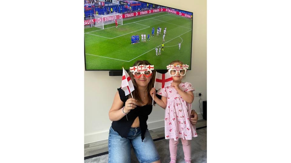 Ella Jordan and her cousin watching England in the Euros