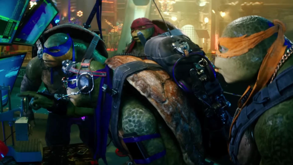 The Ninja Turtles in front of a computer console in Teenage Mutant Ninja Turtles: Out of the Shadows