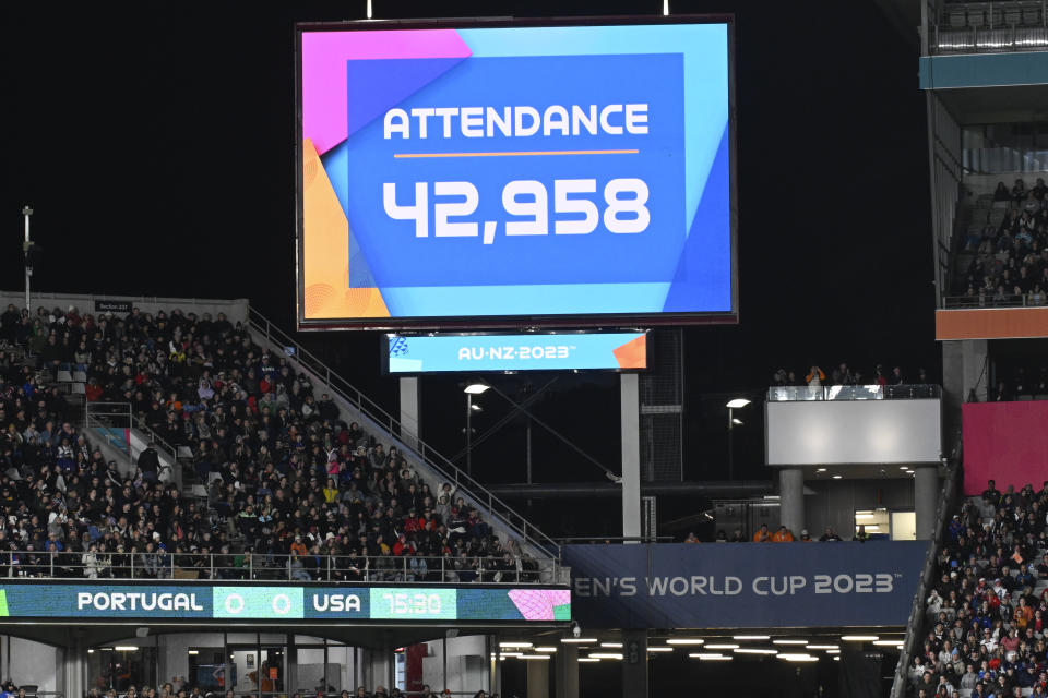 A giant screen show the attendance number for the Women's World Cup Group E soccer match between Portugal and the United States at Eden Park in Auckland, New Zealand, Tuesday, Aug. 1, 2023. (AP Photo/Andrew Cornaga)