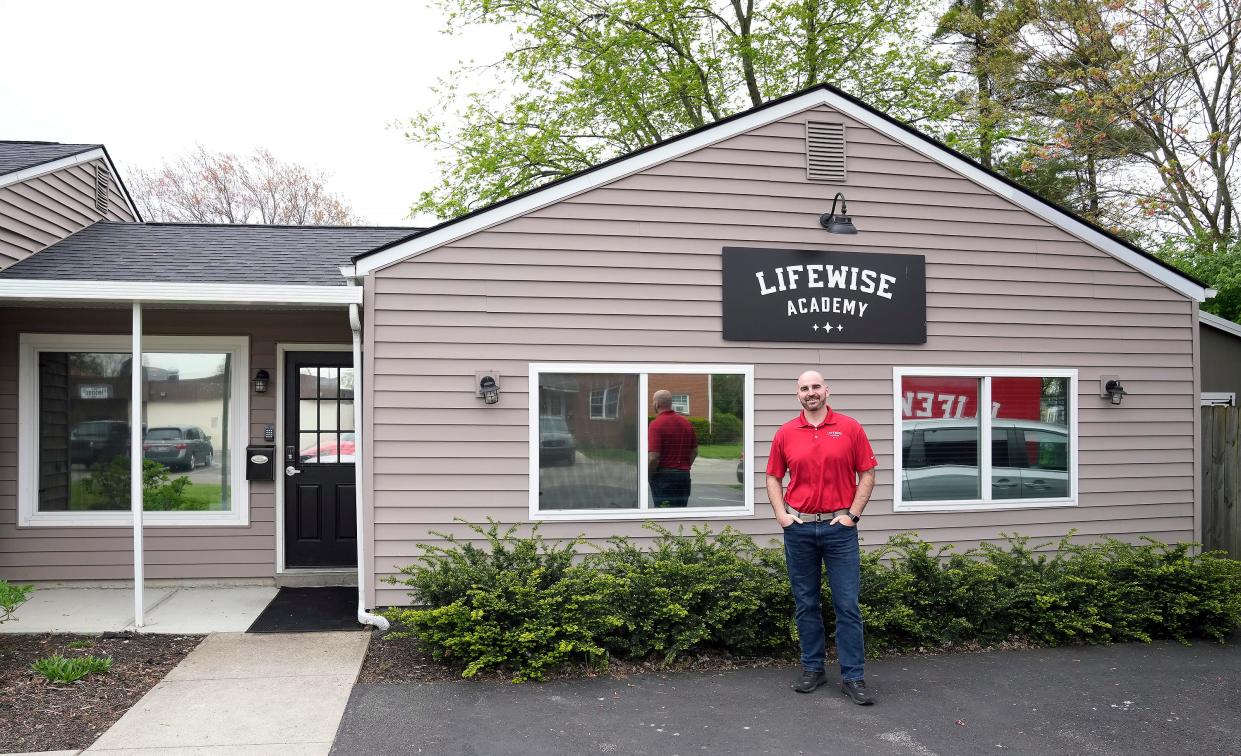 Joel Penton, the founder of LifeWise Academy, stands out in front of their current home office in Hilliard. LifeWise will be moving into the former Aquatic Adventures Ohio building in Hilliard later this year.