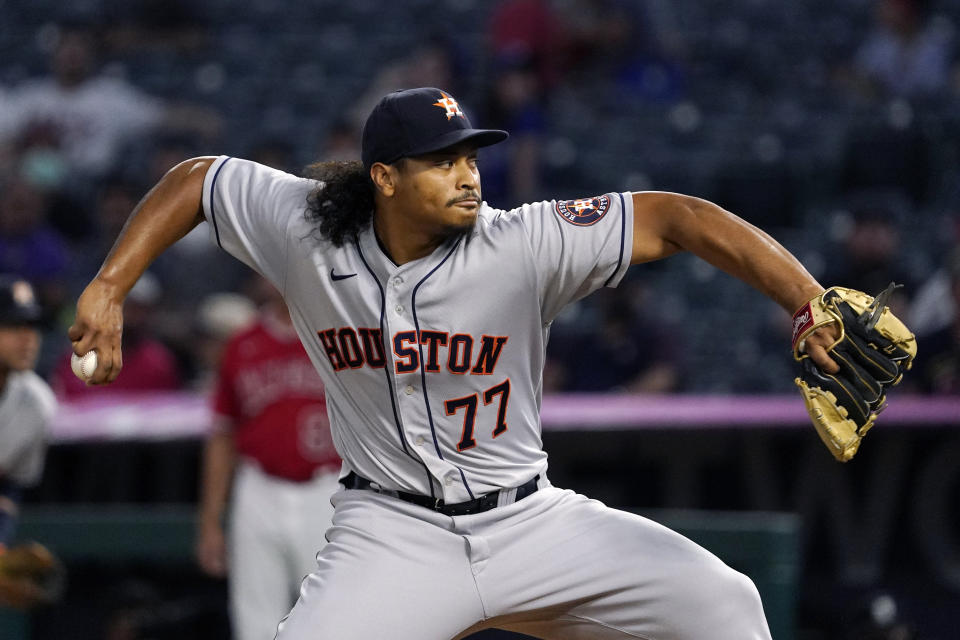 Houston Astros starting pitcher Luis Garcia throws to the plate during the first inning of a baseball game against the Los Angeles Angels Wednesday, Sept. 22, 2021, in Anaheim, Calif. (AP Photo/Mark J. Terrill)