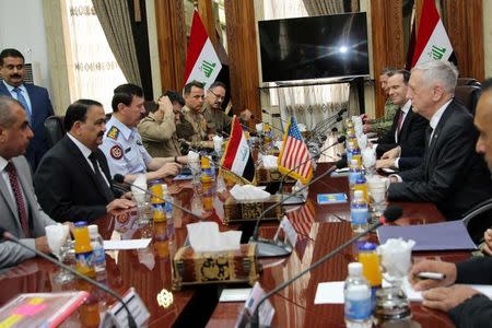 U.S. Defense Secretary Jim Mattis meets with Iraq's Defence Minister Erfan al-Hiyali, in Baghdad, Iraq August 22, 2017. REUTERS/Stringer