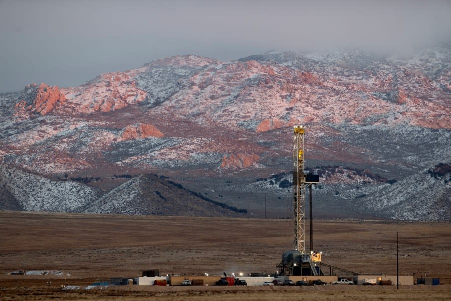 A drill rig stands at a Fervo Energy geothermal site under construction near Milford, Utah, Sunday, Nov. 26, 2023. In Nevada, Fervo’s first operational pilot project has begun pumping carbon-free electricity onto the state’s grid to power Google data centers, Google announced Tuesday, Nov. 28. Fervo is using the Nevada pilot to launch larger projects like this one in Utah. (AP Photo/Ellen Schmidt)