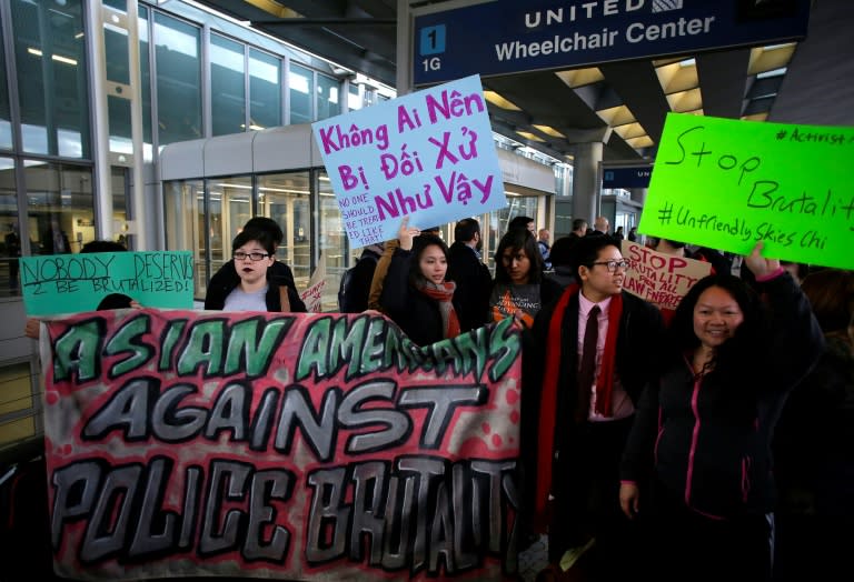 Demonstrators protest against United Airlines at O'Hare International Airport on April 11, 2017 in Chicago