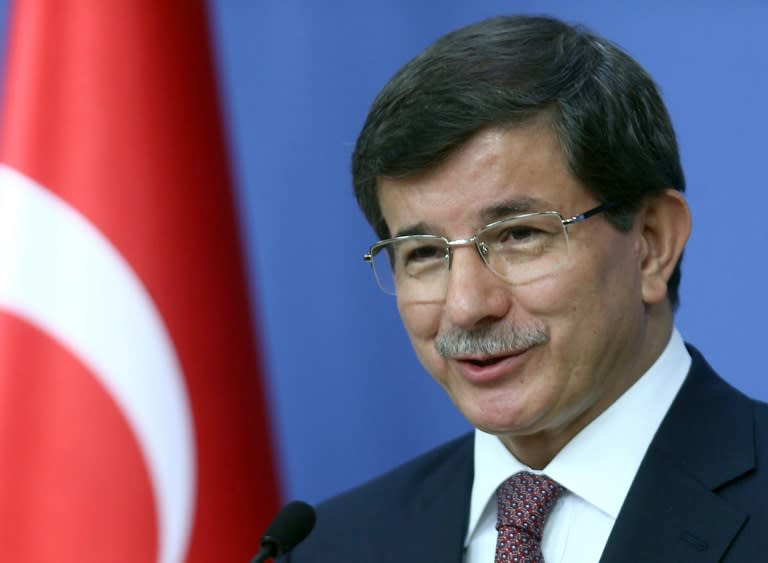 Turkish Prime Minister Ahmet Davutoglu announces his new government in Ankara on August 29, 2014