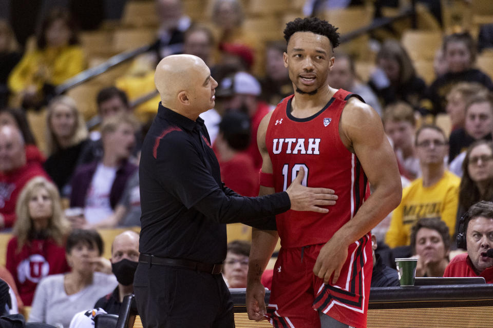 Utah head coach Craig Smith, left, tries to calm down Marco Anthony during the second half of an NCAA college basketball game against Missouri, Saturday, Dec. 18, 2021, in Columbia, Mo. (AP Photo/L.G. Patterson)
