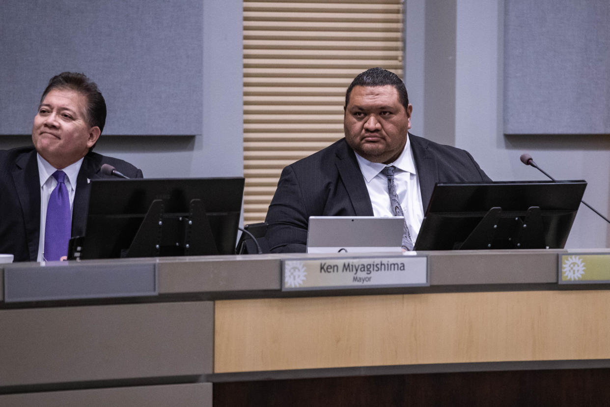 Las Cruces City Manager Ifo Pili, right, attends a city council meeting to discuss the ARPA bid process at Las Cruces City Hall on Tuesday, Feb. 22, 2022.