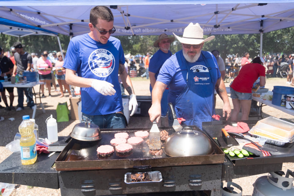 The Republic Services cooking team is hard at work cooking burgers  Saturday at Friona's 17th annual Cheeseburger Festival.