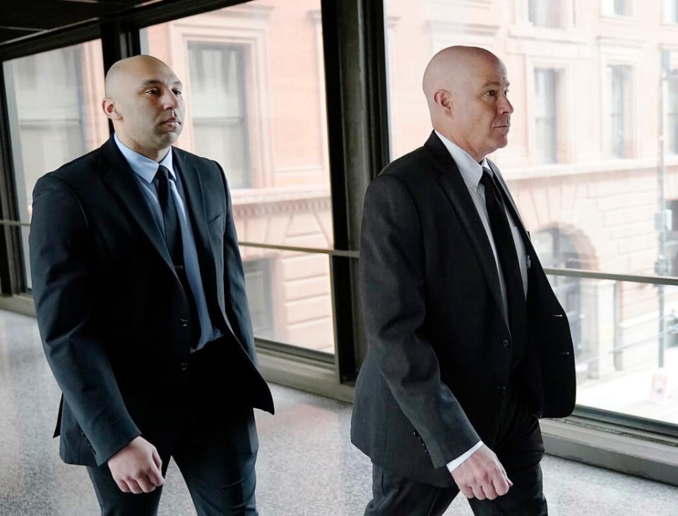 Former Minneapolis police officer J. Alexander Kueng, left, and his attorney Thomas Plunkett arrive for sentencing for violating George Floyd’s civil rights outside the Federal Courthouse Wednesday, July 27, 2022 in St. Paul, Minn. (David Joles/Star Tribune via AP, File)