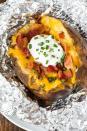 <p>This slow cooker recipe speeds up the prep work for these potatoes and still promises fluffy results. </p><p><strong>Get the recipe at <a href="http://www.wellplated.com/crock-pot-baked-potatoes/" rel="nofollow noopener" target="_blank" data-ylk="slk:Well Plated;elm:context_link;itc:0;sec:content-canvas" class="link ">Well Plated</a>. </strong><br></p><p><strong>Tools you'll need:</strong> Hamilton Beach 6-Quart Portable Slow Cooker ($30, <a href="https://www.amazon.com/Hamilton-Beach-33461-6-Quart-Portable/dp/B005JB049C?tag=syn-yahoo-20&ascsubtag=%5Bartid%7C10070.g.3167%5Bsrc%7Cyahoo-us" rel="nofollow noopener" target="_blank" data-ylk="slk:amazon.com;elm:context_link;itc:0;sec:content-canvas" class="link ">amazon.com</a>)</p>