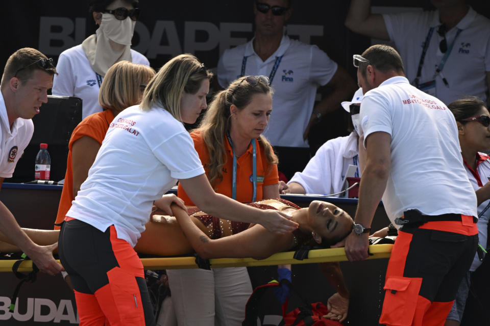 Anita Alvarez of the USA Artistic Swimming team is taken on a stretcher from the pool after collapsing during the solo free final at the 19th FINA World Aquatic Championships in Budapest, Hungary, June 22, 2022. / Credit: Anna Szilagyi/AP