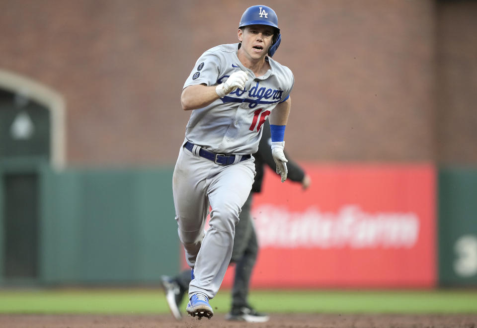 SAN FRANCISCO, CALIFORNIA - JULY 28: Will Smith #16 of the Los Angeles Dodgers races into third base with a two-run RBI triple against the San Francisco Giants in the top of the third inning at Oracle Park on July 28, 2021 in San Francisco, California. (Photo by Thearon W. Henderson/Getty Images)