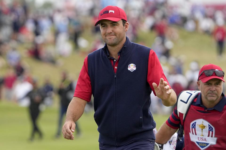 Team USA's Scottie Scheffler walks to the 11th hole during a Ryder Cup singles match at the Whistling Straits Golf Course Sunday, Sept. 26, 2021, in Sheboygan, Wis. (AP Photo/Jeff Roberson)