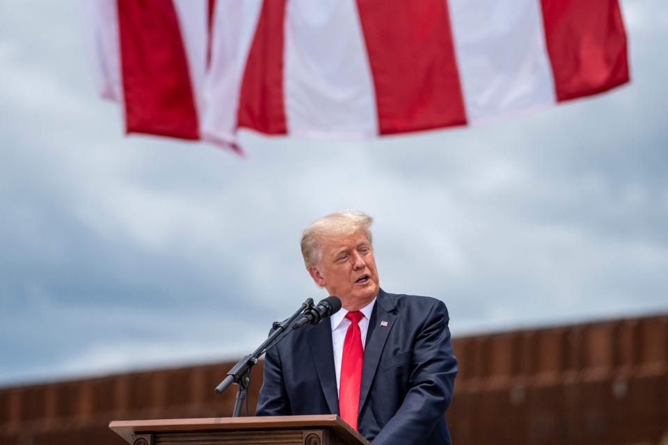 Former US President Donald Trump speaks during a visit to the border wall near Pharr, Texas on June 30, 2021. - Former President Donald Trump visited the area with Texas Gov. Greg Abbott to address the surge of unauthorized border crossings that they blame on the Biden administration's change in policies. (Photo by SERGIO FLORES/AFP via Getty Images)