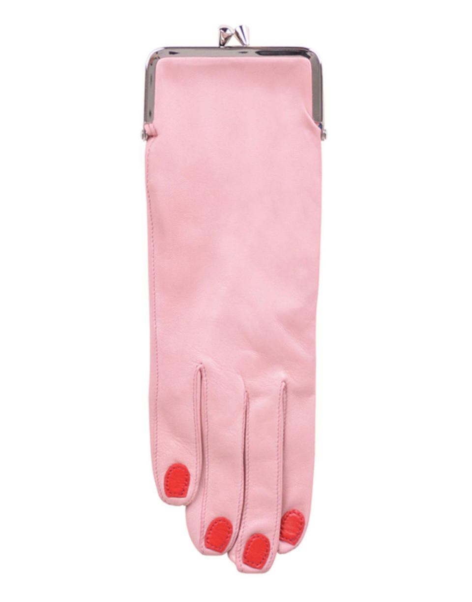 <p>Pink Glove Coin Purse by Welcome Companions, $240, <a rel="nofollow noopener" href="https://www.garmentory.com/sale/welcome-companions/wallets-cases/58044-pink-glove-coin-purse#sm.0001cy9zfd116af5art8ty06ql895" target="_blank" data-ylk="slk:garmentory.com;elm:context_link;itc:0;sec:content-canvas" class="link ">garmentory.com</a>.</p>