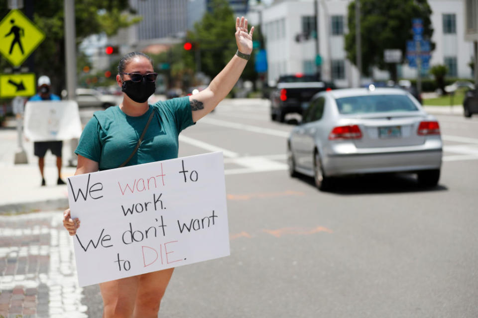 Middle school teacher Danielle Weigand joins teachers and administrators from Hillsborough County Schools in Tampa, Florida, who rallied against the reopening of schools due to health and safety concerns amid the coronavirus pandemic. (Photo by Octavio Jones/Getty Images)