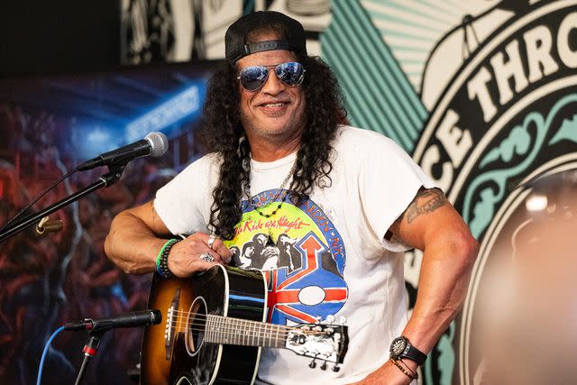 <p>Scott Dudelson/Getty</p> Slash performs onstage in support of his new album ;Orgy of the Damned; at Amoeba Music on May 29, 2024 in Los Angeles, California