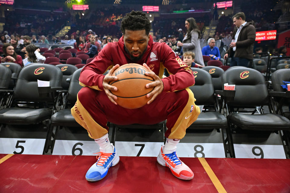 CLEVELAND, OHIO - DECEMBER 18: Donovan Mitchell #45 of the Cleveland Cavaliers meditates prior to the game against the Houston Rockets at Rocket Mortgage Fieldhouse on December 18, 2023 in Cleveland, Ohio. NOTE TO USER: User expressly acknowledges and agrees that, by downloading and or using this photograph, User is consenting to the terms and conditions of the Getty Images License Agreement. (Photo by Jason Miller/Getty Images)