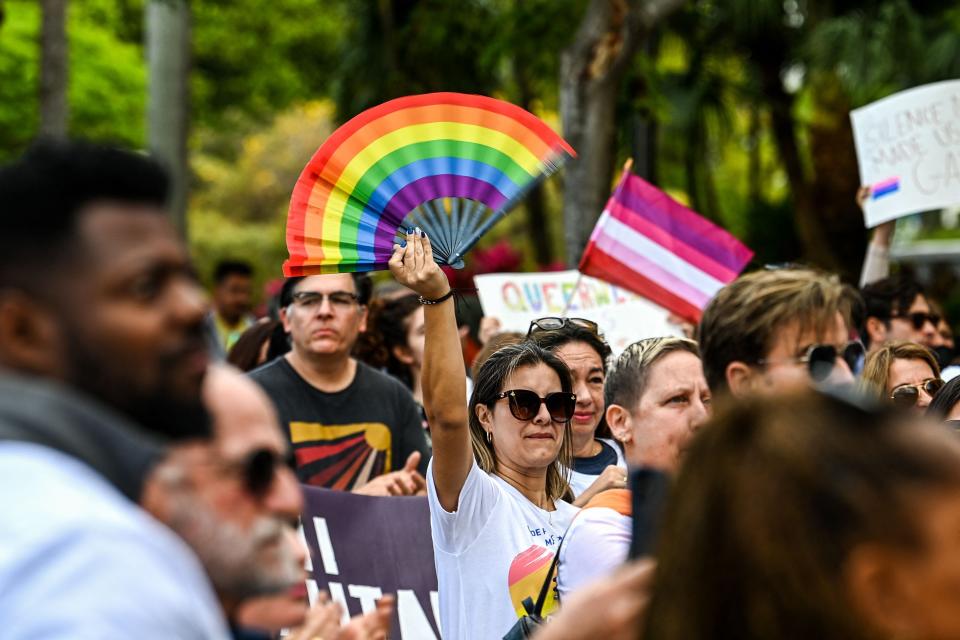 Members and supporters of the LGBTQ community attend the “Say Gay Anyway” rally in Miami Beach, Fla., on March 13, 2022, after Florida's Legislature passed a controversial bill that will limit classroom discussion about sexual orientation and gender identity. Critics complain the bill, which they’ve dubbed “Don’t Say Gay” will hurt LGBTQ teachers and students.