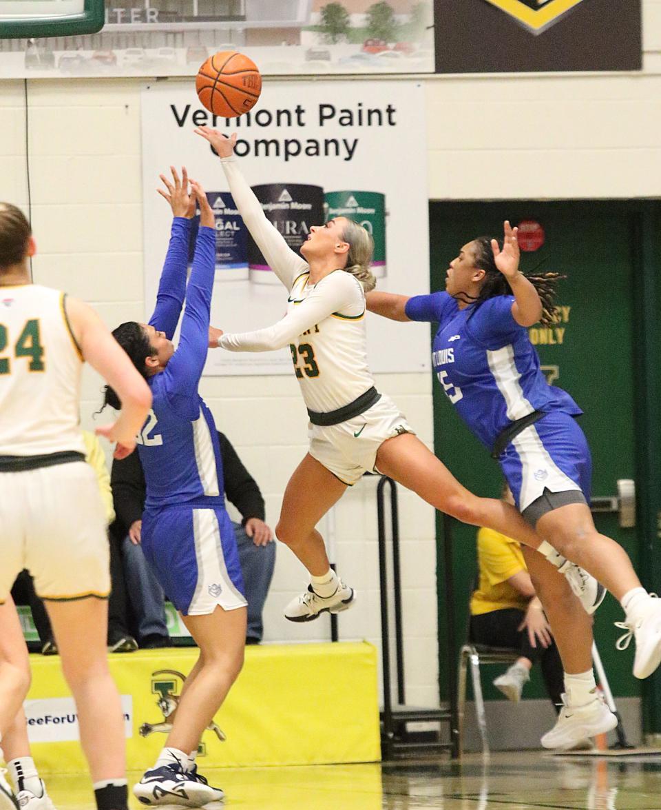 Vermont's Emma Utterback scores on a layup during the Catamounts' 57-54 loss to St. Louis in the WNIT Fab 4 at Patrick Gym on Wednesday, April 3, 2024.