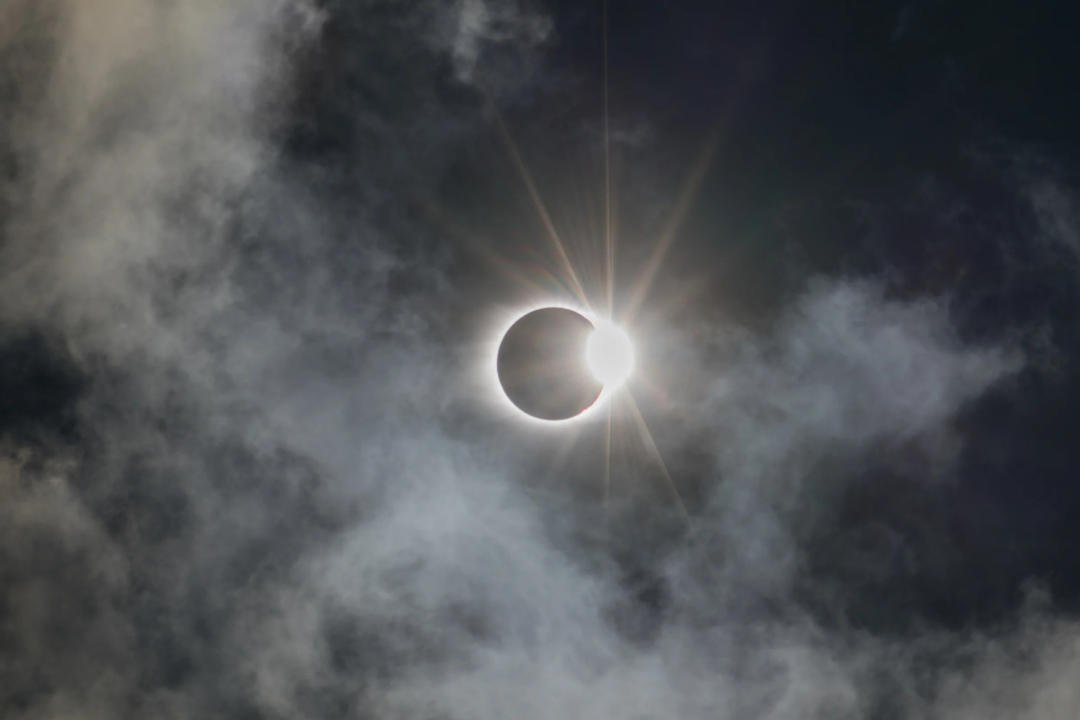 The moon covered the sun, creating a wedding ring effect among clouds during the eclipse in 2017. (Getty Images)