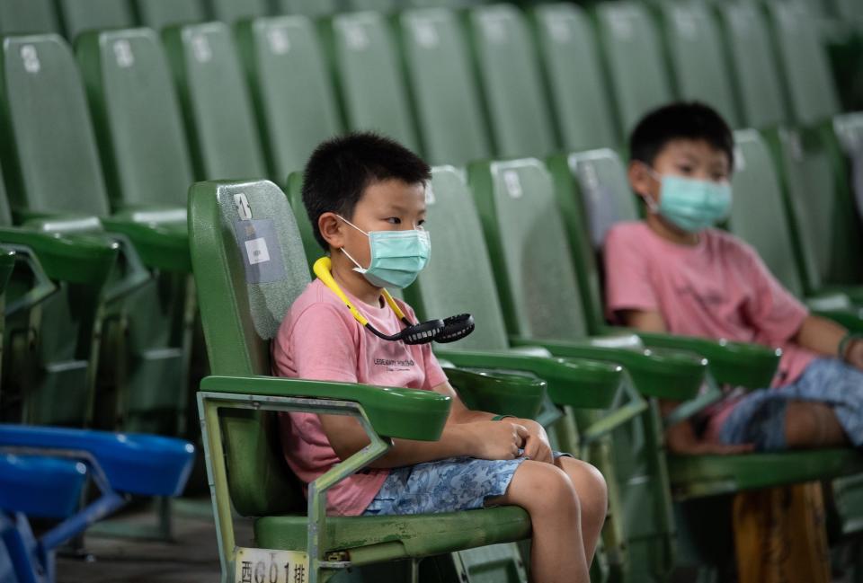 Children at a baseball game in Taichung, Taiwan on May 10, 2020.