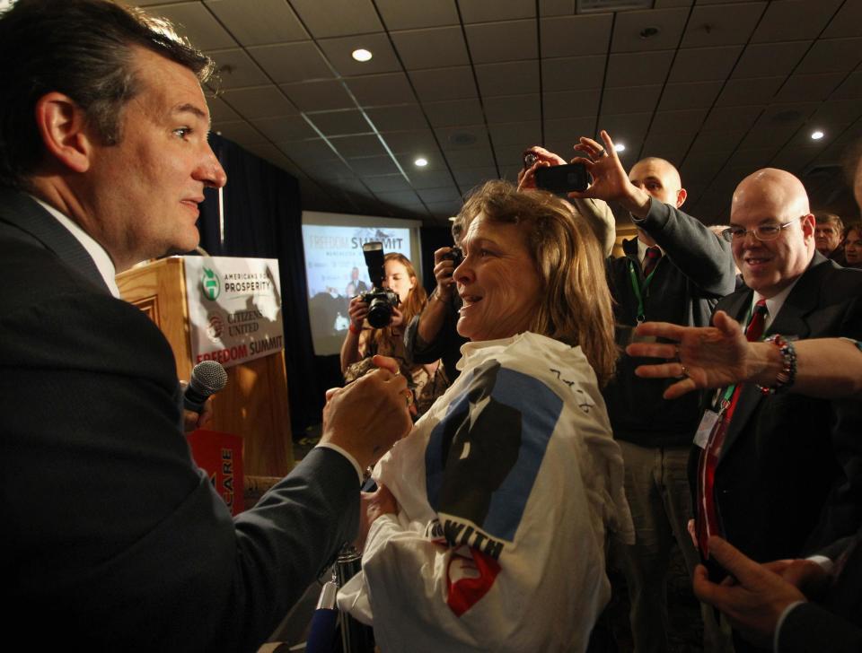 Sen. Ted Cruz, R-Texas, is greeted by supporters after speaking at a GOP Freedom Summit, Saturday, April 12, 2014 in Manchester, N.H. Several potential Republican White House contenders _ among them Kentucky Sen. Rand Paul, Cruz, and former Arkansas Gov. Mike Huckabee _ headline a conference Saturday in New Hampshire, hosted by the conservative groups Citizens United and Americans for Prosperity. (AP Photo/Jim Cole)