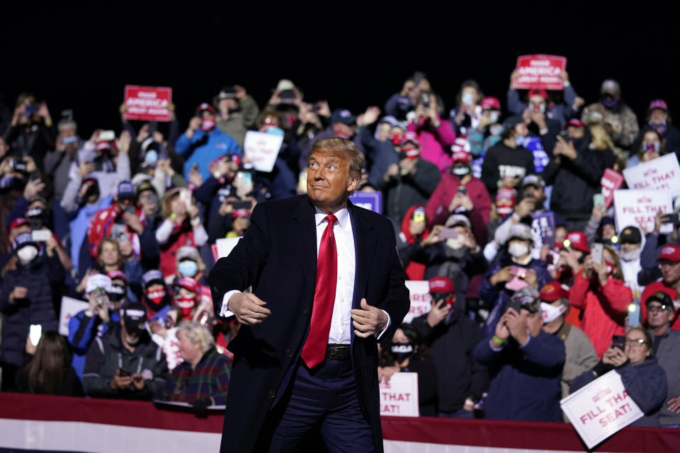 President Donald Trump arrives to speak during a campaign rally at John Murtha Johnstown-Cambria County Airport, Tuesday, Oct. 13, 2020, in Johnstown, Pa. (AP Photo/Evan Vucci)