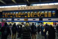 Passengers at London Euston station
