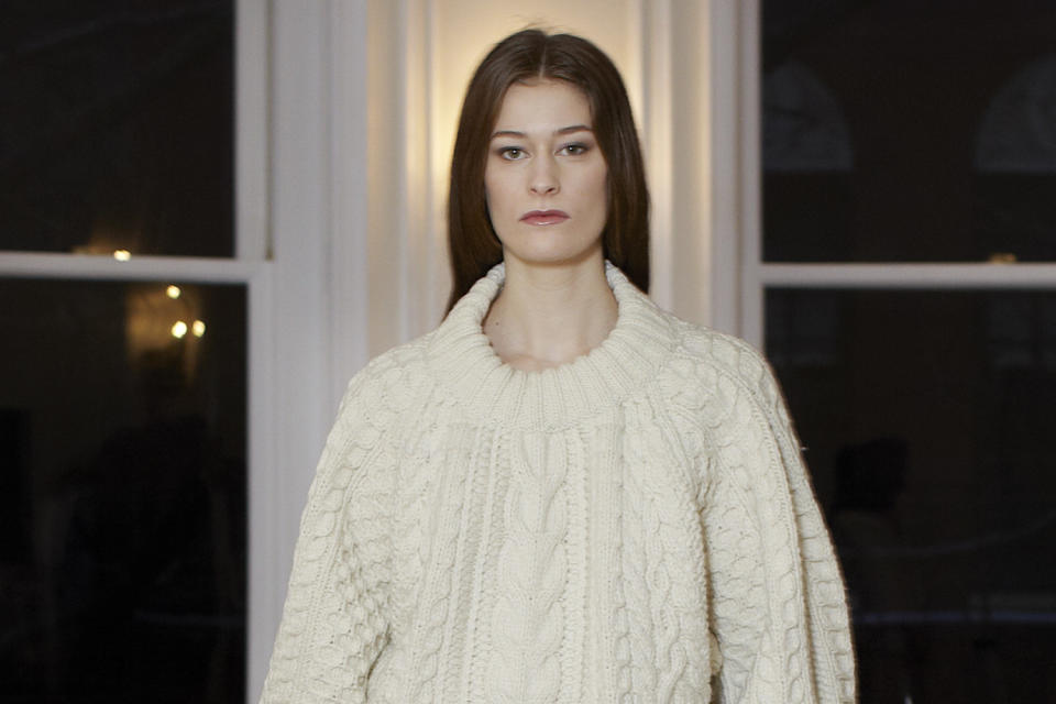 In this photo provided by The Row a model walks the runway during The Row Fall 2013 fashion show during Fashion Week, Monday, Feb. 11, 2013, in New York. (AP Photo/Christian Siriano)