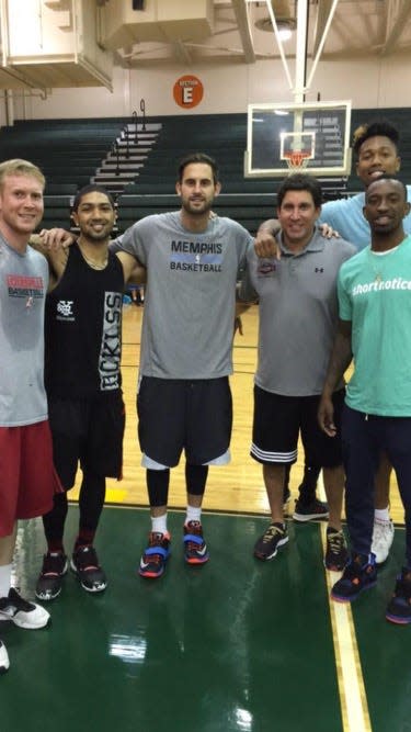 Mark Lieberman, right middle, with former Louisville men's basketball players, including Peyton Siva, Luke Hancock and Russ Smith. A former U of L assistant, Lieberman is coaching Siva, Smith and other ex-Cardinals in The Basketball Tournament.