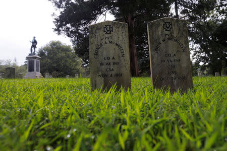 The gravestones of Civil War Confederate soldiers stand in the Confederate cemetery, ahead the one-year anniversary of the fatal white-nationalist rally, in Charlottesville, Virginia, U.S., July 31, 2018. REUTERS/Brian Snyder