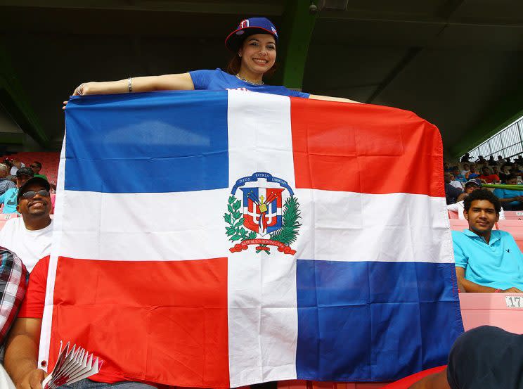 SAN JUAN, PUERTO RICO - MARCH 09: Fans of the Dominican Republic cheer their team on against Spain during the first round of the World Baseball Classic at Hiram Bithorn Stadium on March 9, 2013 in San Juan, Puerto Rico. (Photo by Al Bello/Getty Images)