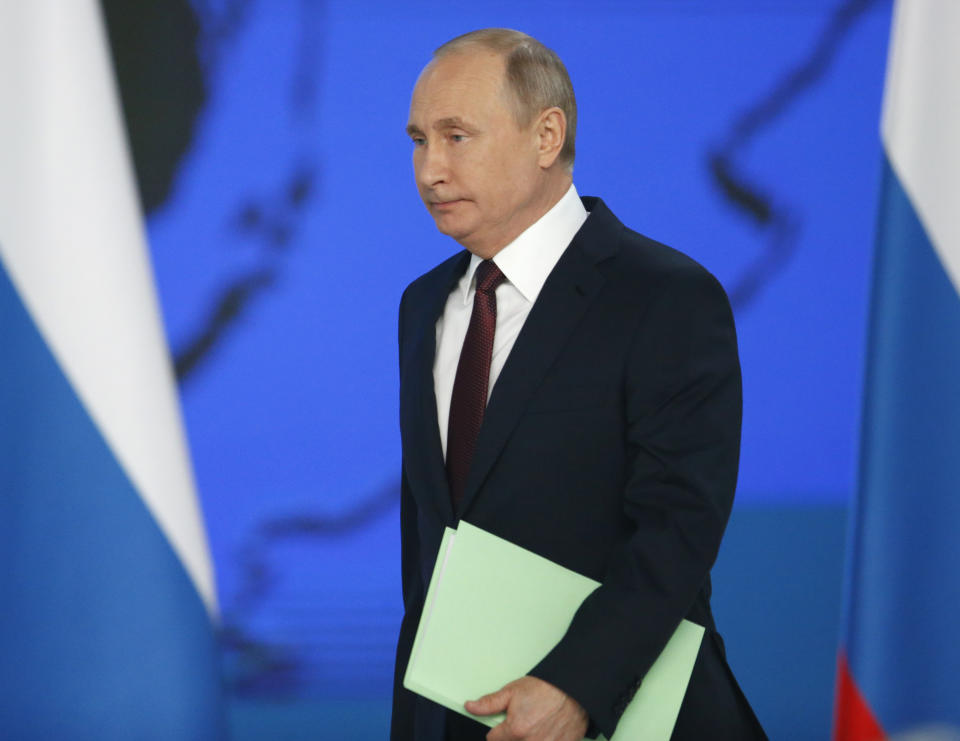 Russian President Vladimir Putin walks to deliver a state-of-the-nation address in Moscow, Russia, Wednesday, Feb. 20, 2019. (AP Photo/Alexander Zemlianichenko)