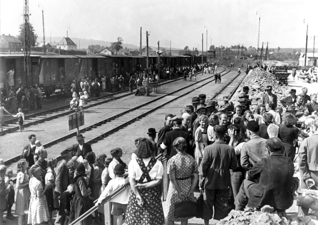 <span class="caption">A trainload of expelled ethnic Germans from Czechoslovakia arrives in Bavaria, Germany, after World War II.</span> <span class="attribution"><a class="link " href="https://www.gettyimages.com/detail/news-photo/refugee-train-with-sudeten-germans-has-arrived-at-transit-news-photo/1060983050?adppopup=true" rel="nofollow noopener" target="_blank" data-ylk="slk:dpa/picture alliance via Getty Images;elm:context_link;itc:0;sec:content-canvas">dpa/picture alliance via Getty Images</a></span>